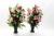 Vase de Roses et de Lys délicieux réhaussé de feuillage